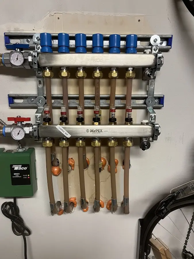 Plumber performing Water Heater Repair at a residential property in Marseilles